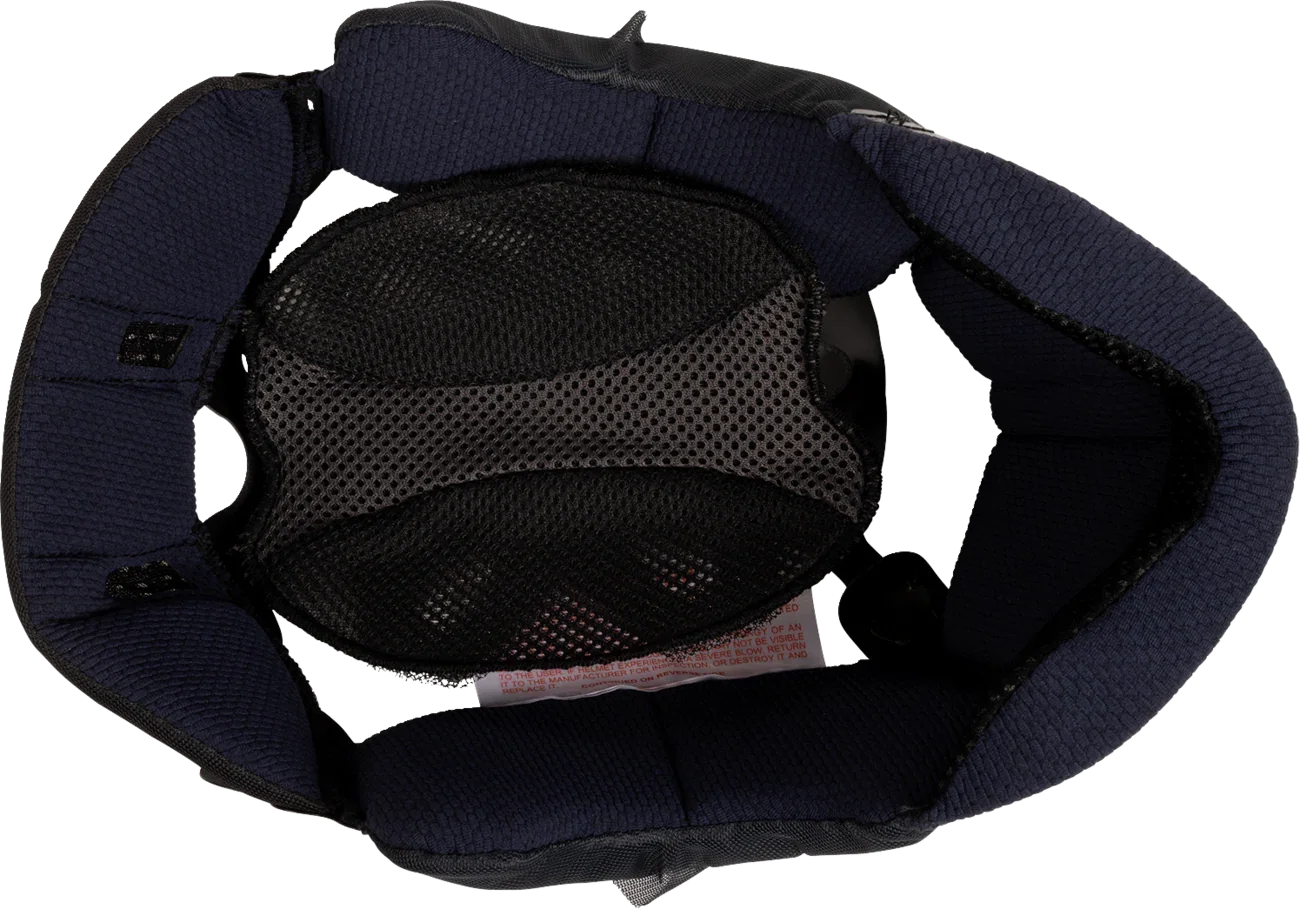 Interior view of motorcycle helmet with navy padding and black mesh lining for comfort and ventilation
