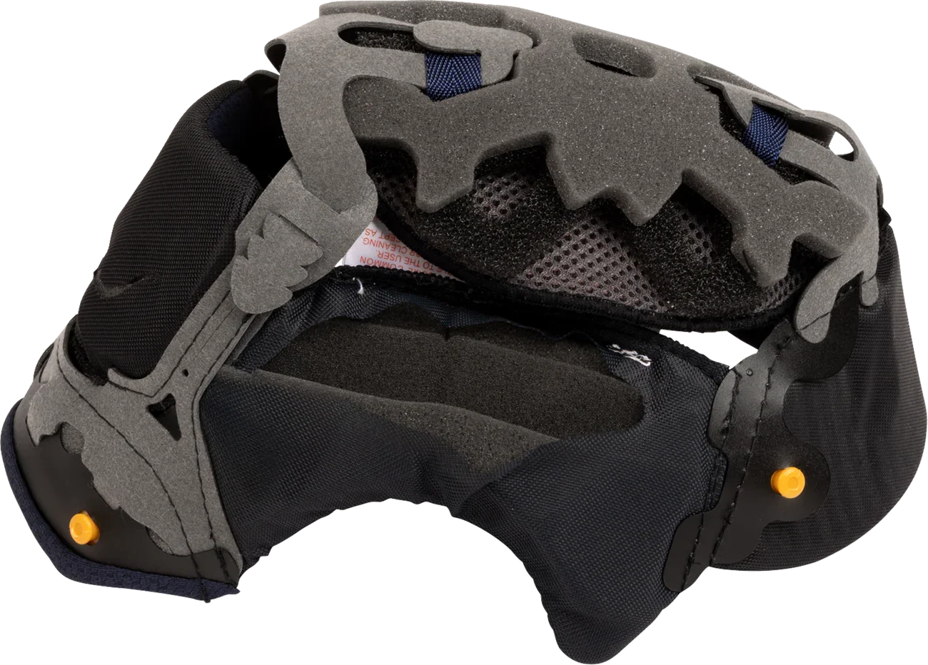Motorcycle helmet interior with gray foam padding, black mesh lining, and orange adjustment knobs