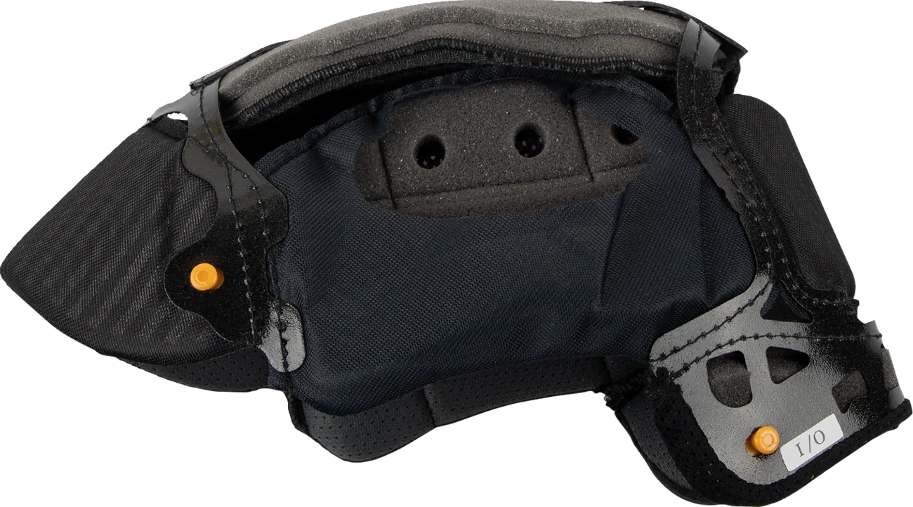 Black motorcycle helmet interior with ventilation holes and orange adjustment knobs