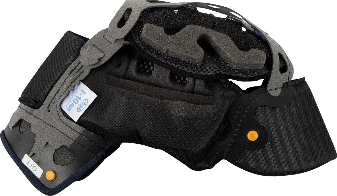 Black motorcycle helmet interior with foam padding, ventilation, and 1-10mm adjustment label