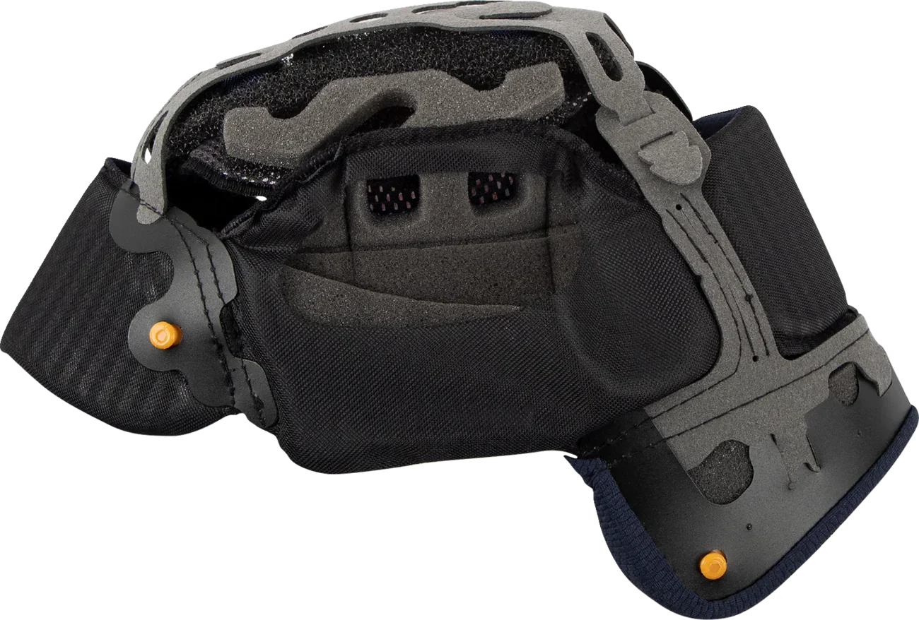 Black motorcycle helmet interior with gray foam padding and orange adjustment knobs for comfort and fit