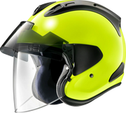 Bright yellow Arai motorcycle helmet with clear visor and black accents, designed for safety and style.