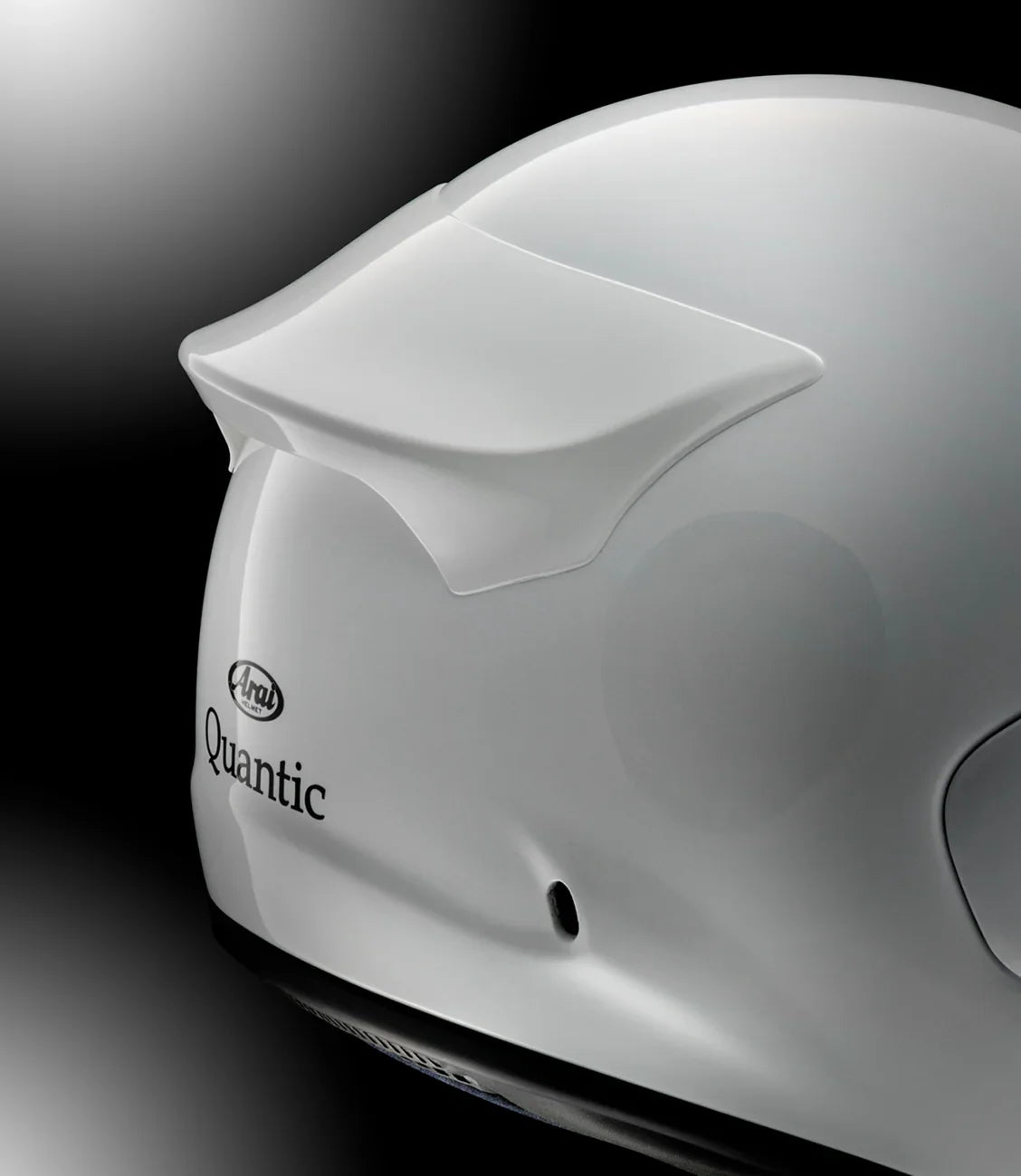 White Arai Quantic motorcycle helmet with rear spoiler and sleek design for safety and style