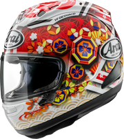 Arai full-face motorcycle helmet with vibrant floral and geometric design, featuring clear visor and YF Design graphics.