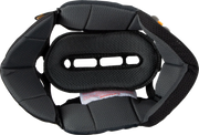 Black motorcycle helmet interior padding with ventilation slots and warning label