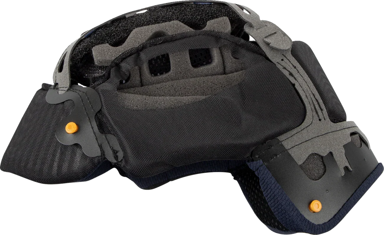 Black motorcycle helmet interior with adjustable padding and orange adjustment knobs for secure fit
