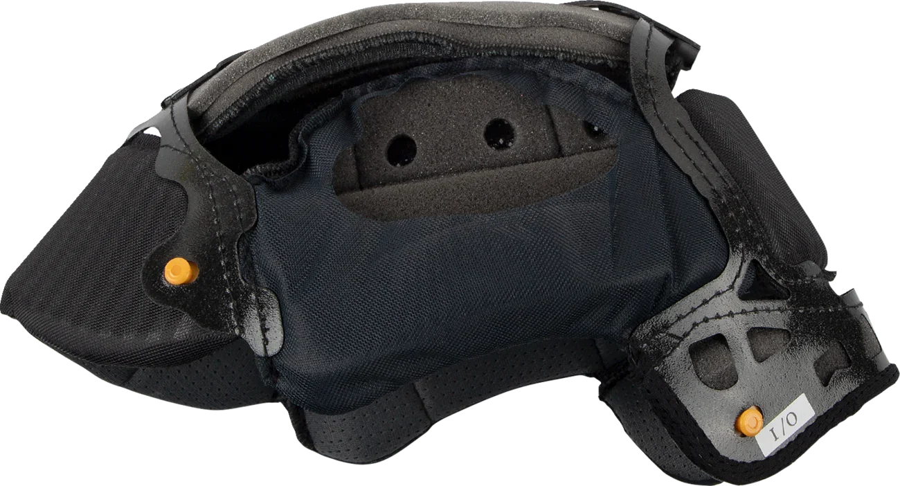 Black motorcycle helmet interior with ventilation holes and orange adjustment knobs for comfort fit
