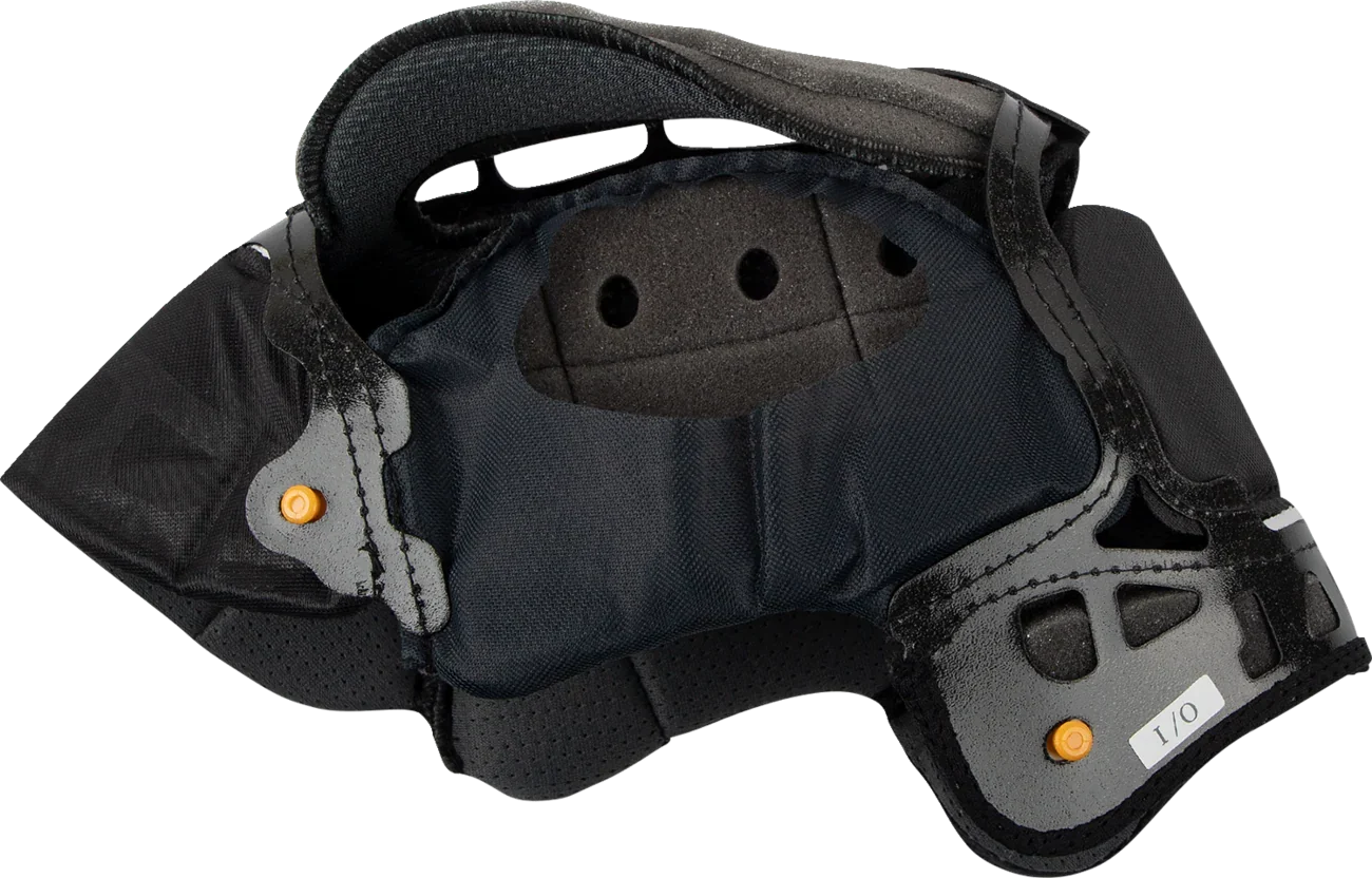 Black motorcycle helmet interior with ventilation holes and orange adjustment knobs