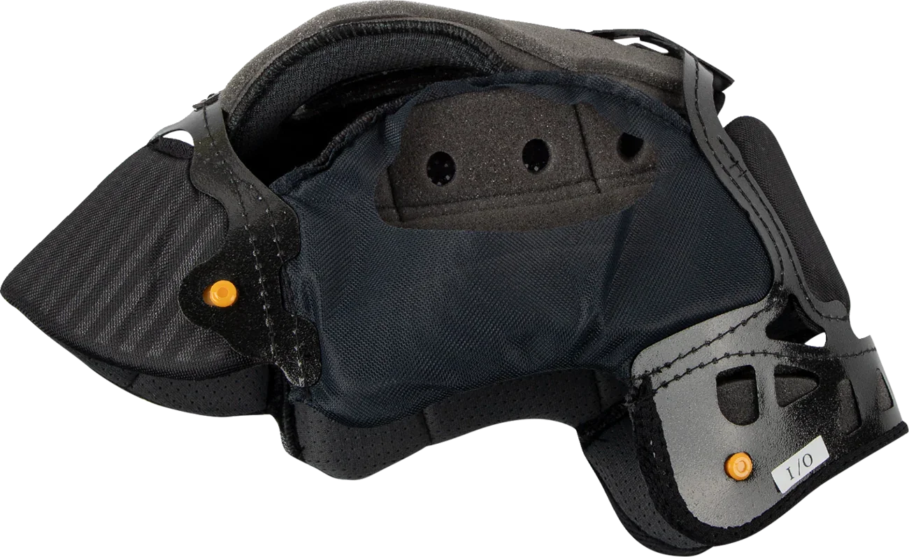 Black motorcycle helmet interior with ventilation holes and orange adjustment knobs