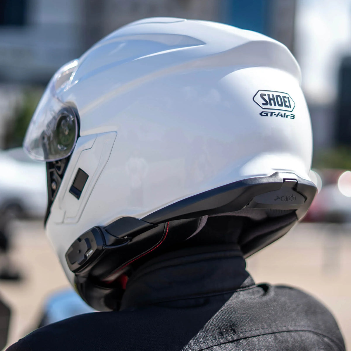 Cardo Packtalk-S installed in a SHOEI helmet