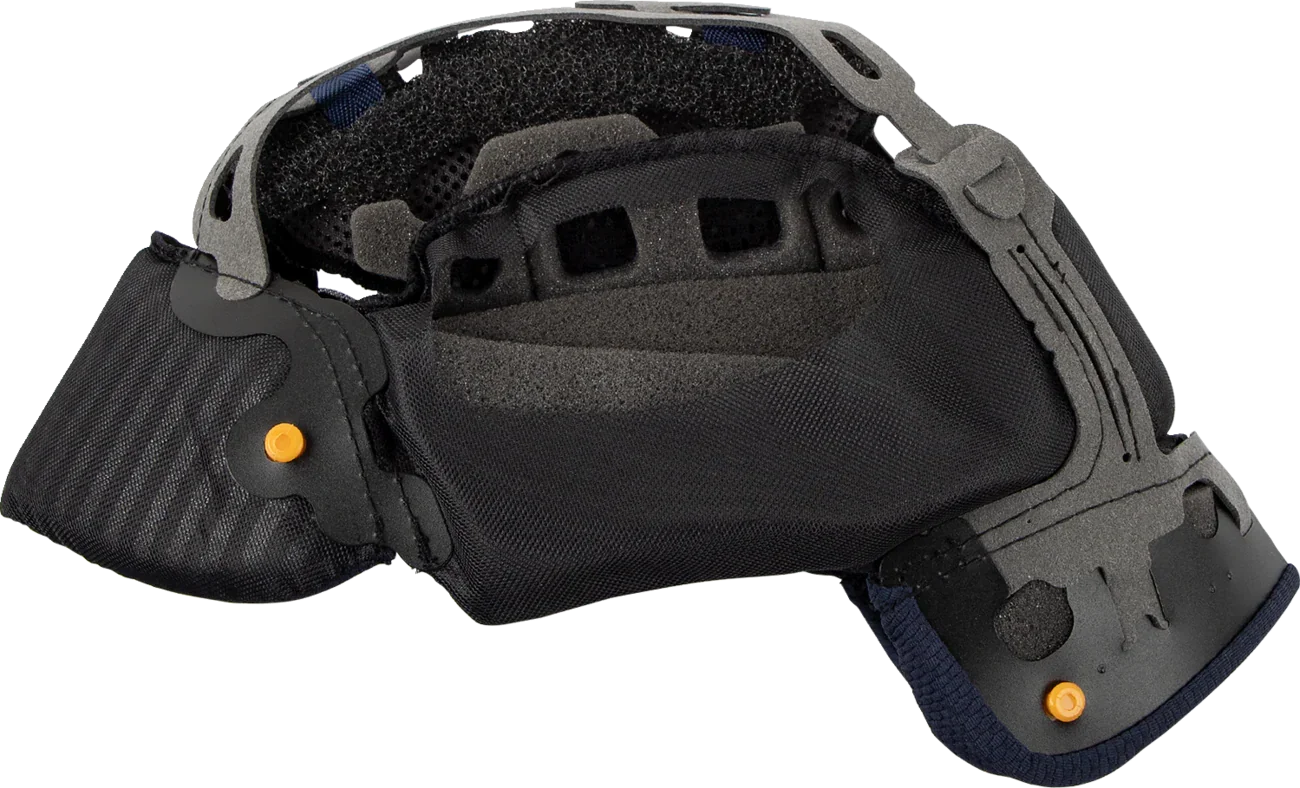 Motorcycle helmet interior with black padding, ventilation holes, and orange adjustment knobs for comfort and fit