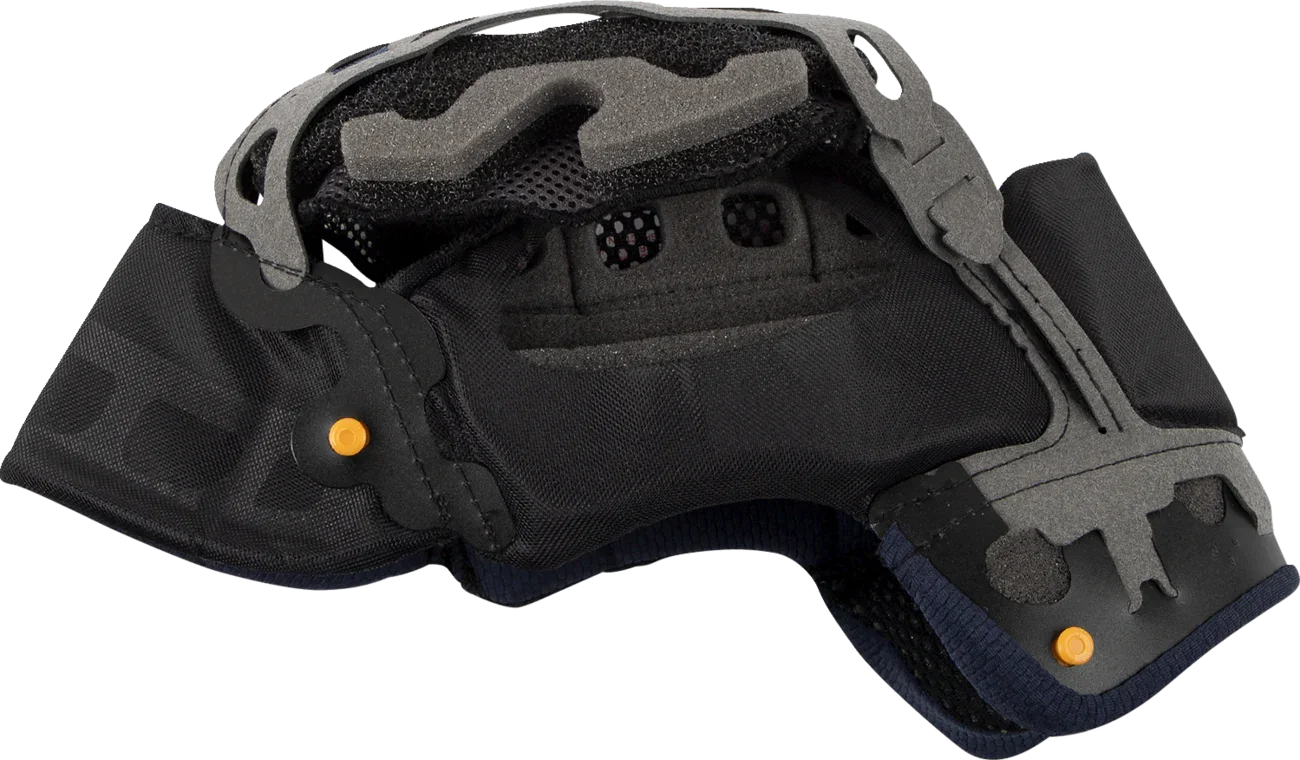 Black motorcycle helmet interior with gray foam padding, mesh lining, and orange adjustment knobs for comfort and fit.