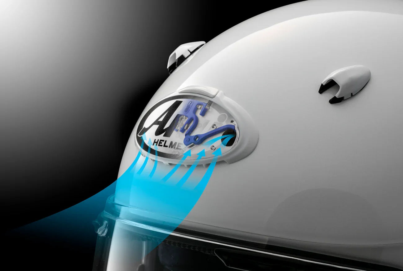White motorcycle helmet with airflow ventilation system and clear visor for optimal cooling
