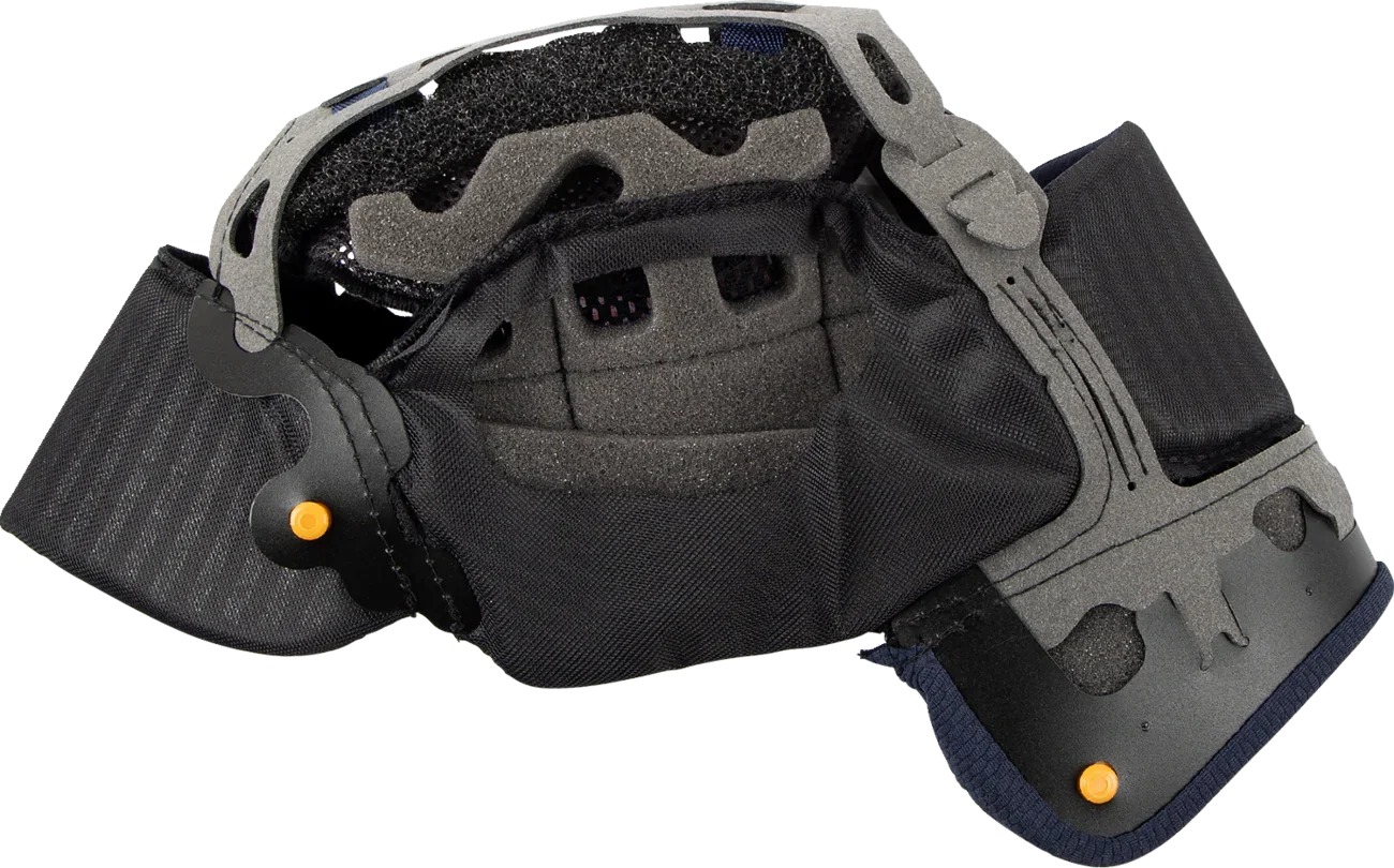 Black motorcycle helmet interior with padded lining, ventilation holes, and orange adjustment knobs for comfort and fit.